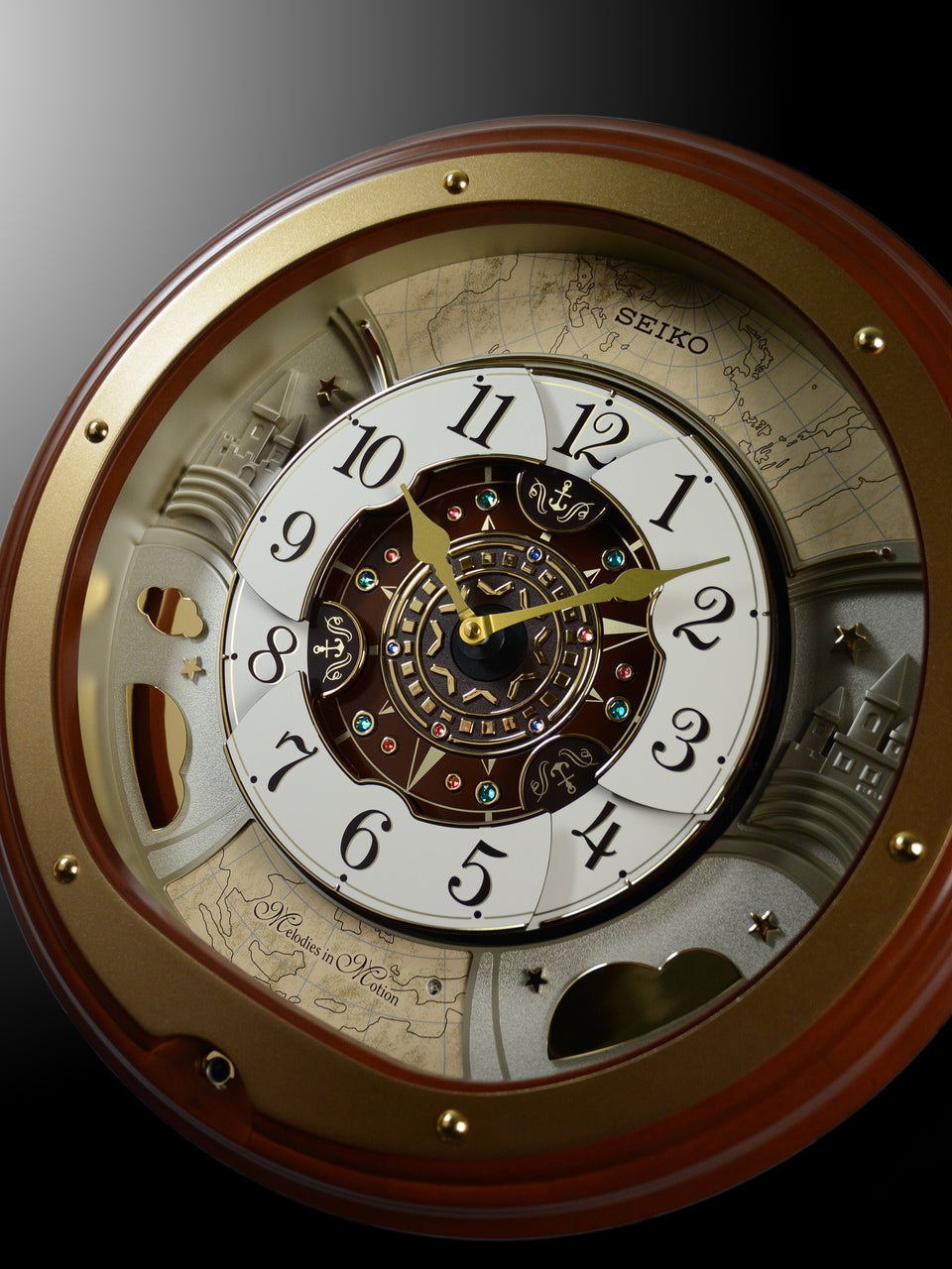 MELODIES IN MOTION ROUND MUSICAL WALL CLOCK QXM381B