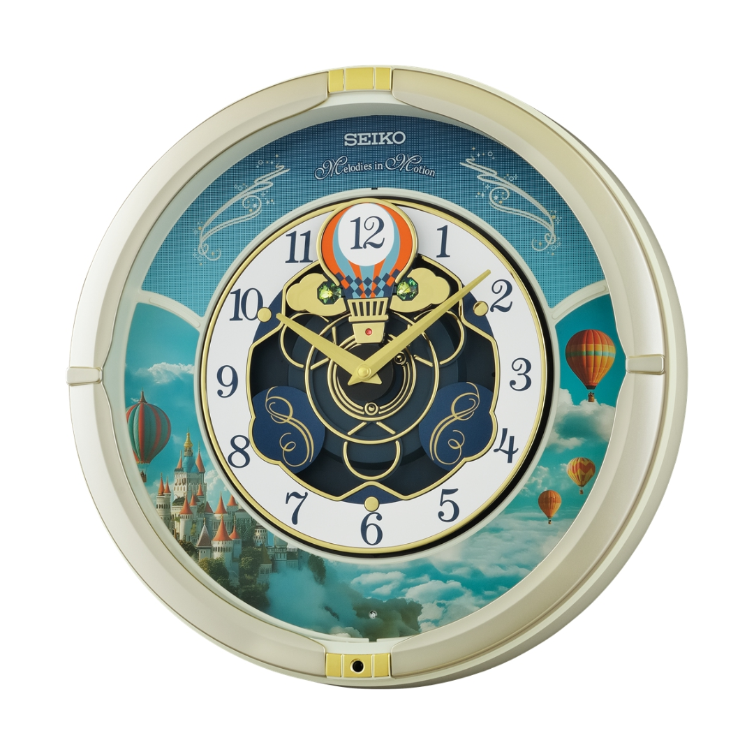 MELODIES IN MOTION ROUND MUSICAL WALL CLOCK QXM616S