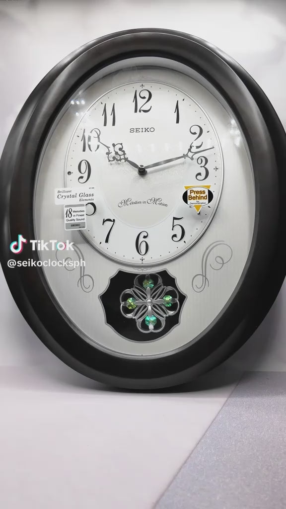 Melodies in Motion Round Musical Wall Clock QXM606N 42 cm