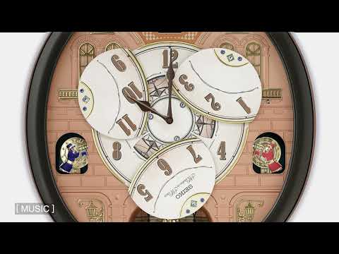 Melodies in Motion Round Musical Wall Clock QXM601B 44.3 cm