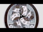MELODIES IN MOTION ROUND MUSICAL WALL CLOCK QXM615B