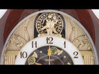 Melodies in Motion Round Musical Wall Clock QXM604B 48 cm